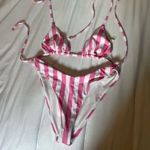 white and pink striped victoria’s secret swimsuit
